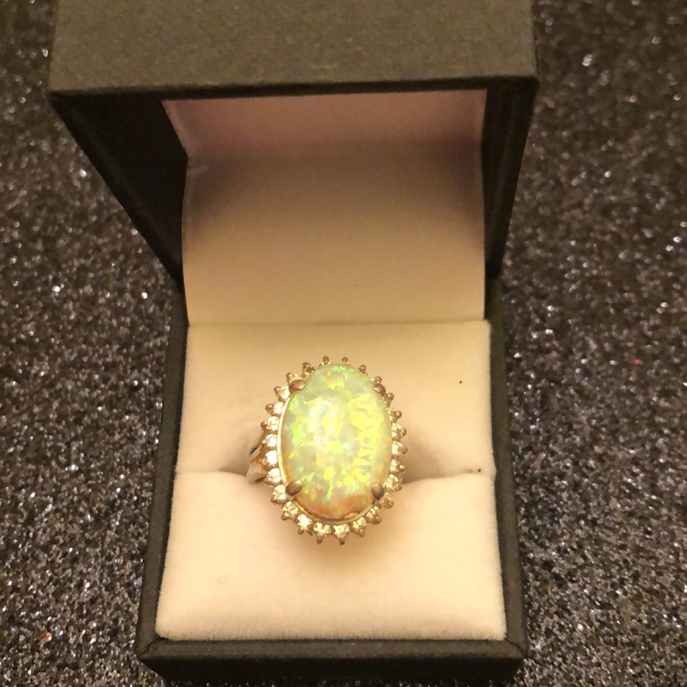 Stamped 925 ring size 6.5 with simulated opal